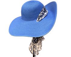 "Green Sunhat, Natural Straw Hat, Summer Hat, Spring Fashion, Beach Hat, Spring Accessories, Sunblock Hat, Formal Hat, Oversized Brim Hat Giant Brim Sunhat with 2 grommets on the sides, so that you can pull through a scarf or ribbon. One Leopard 20 x 62 inches poly scarf is included. The brim is extra wide, at 6 inches. Sewn from Toyo straw. To measure your head: Place a measuring tape on your forehead just above eyebrow level and pass it around your head, ensuring that the widest part of the he Blue Wide Brim Hat For Beach Season, Blue Wide Brim Bucket Hat For Beach, One Size Blue Bucket Hat For Vacation, Blue One Size Bucket Hat For Vacation, Blue Brimmed Panama Hat For Beach, One Size Summer Cap Style Sun Hat, Blue Summer Hat One Size, One Size Casual Summer Cap-style Sun Hat, Beach Cap Hat One Size