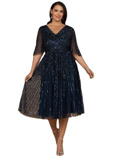 Beaded v-neckline midi dress. This dress features a long flowing A-line silhouette giving an elegant sequined Midi look. It is a great dress for a fun and easy night out, or a wedding guest! It's great for someone looking for a modest and fun look Back zipper Beaded tulle on stretch jersey lining Professionally clean Imported Short sleeves Midi dress Fits true to size, we recommend ordering your normal size. Fitted body with flowing skirt Glamorous Embellished V-neck Midi Dress, Midi Length Gala Dress With Contrast Sequin, Midi Length Dress With Contrast Sequin For Gala, V-neck Midi Dress For Evening Wedding, Evening Wedding Midi Dress With V-neck, Elegant Knee-length Sequin Dress With Contrast Sequins, Evening Midi Dress With Sequins, Contrast Sequin Midi Dress For Gala, Formal Knee-length Dress With Contrast Sequin