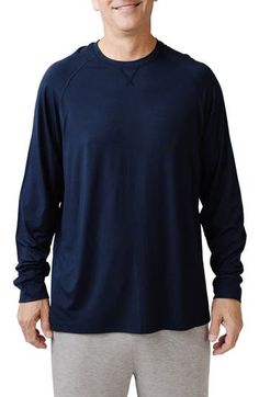 Soft, breathable and all-day comfortable, this stretchy crewneck sweatshirt wicks away moisture and makes a great go-to whether you're active or relaxing. Crewneck Moisture-wicking fabric engineered for dryness and comfort 70% viscose, 26% acrylic, 4% spandex Machine wash, tumble dry Imported Casual Moisture-wicking Tops For Layering, Long Sleeve Moisture-wicking Activewear For Layering, Long Sleeve Moisture-wicking Activewear, Casual Tops With Moisture-wicking For Layering, Go-dry Crew Neck Tops For Fall, Moisture-wicking Tops For Light Sports In Fall, Fall Long Sleeve Tops For Light Sports, Long Sleeve Tops For Light Sports In Fall, Moisture-wicking Sweatshirt For Light Sports In Fall