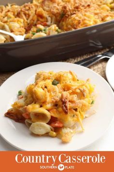 the casserole dish is ready to be eaten and served on the table with utensils