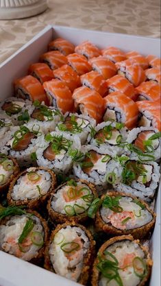 there are many sushi rolls in the box