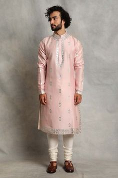 Pink chanderi kurta with geometric applique and front buttons. Paired with churidar.
Component: 2
Pattern: Applique
Type Of Work: Geometric
Neckline: Mandarin
Sleeve Type: Full Sleeves 
Fabric: Kurta: Chanderi
Color: Pink
Other Details: 
Front buttons
Applique work
Occasion: Puja - Aza Fashions Pink Kurta For Men, Applique Kurta, Geometric Applique, White Churidar, Pink Kurta, Types Of Work, Pernia Pop Up Shop, Churidar, Kurta Set