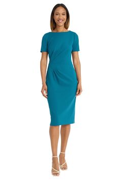 Introducing Bebe, the epitome of sleek sophistication. This form-fitting midi dress features a boat neckline, short sleeves, and subtle side ruching for a flattering silhouette. Perfect for the office, client meetings, or dressed up for evening events. Pair Bebe with pumps and statement earrings for a polished look, or add a blazer for a professional ensemble that commands attention. Turquoise Knee-length Summer Midi Dress, Casual Turquoise Knee-length Dress, Casual Turquoise V-neck Dress, Missy Dresses, Bearded Lady, Short Sleeve Shift Dress, Maggy London, Daytime Dresses, Boat Neckline