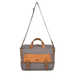 The Valley Oak Messenger embodies robust elegance and versatile functionality for both the discerning urbanite and the adventurous trailblazer. Handcrafted with meticulous attention to detail, this bag combines the ruggedness of 100% genuine leather with the resilience of recycled hardware. Its 100% cotton lining and vegetable-based dyes tell a story of quality and eco-consciousness. This bag features external and internal pockets, including a padded laptop compartment, and a main zipper closure with a strap buckle flap, ensuring secure and organized storage. | TSD Brand Valley Oak Messenger, Grey Organized Storage, Tell A Story, The Valley, Consciousness, Storage Organization, Genuine Leather, Laptop, Buckle, Zipper