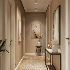 Subtle pops of color, such as muted pastels and earthy hues Hallway Wall Design Ideas, Corridor Wall Design, Taupe Hallway, Corridor Lighting Design, Scandinavian Entryway Ideas, Cozy Hallway, Scandi Lighting, Hallway Aesthetic, Scandinavian Hallway