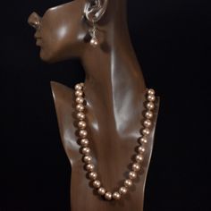 This is one of the "Putting Pearls On The Girls" pro-Kamala Harris Collection!  All my necklaces are hand knotted. This makes a difference to the price naturally, but truth is, every necklace made with cord can eventually break, even after a couple of generations or more have enjoyed it. No scatter of beads here..This color will be totally useful in that you can wear it with just about every color and with the approaching winter, it will lovely with Brown, Tan or Black clothes too. Matching Earr Elegant 8mm Beads Jewelry Gift, Elegant Hand-strung Sterling Silver Necklaces, Elegant Silver Hand-strung Beaded Necklaces, Elegant Hand-strung Beaded Necklaces, Elegant Silver Beaded Necklaces Hand-strung, Elegant Hand-strung Beaded Necklace For Gift, Silver Hand-strung Pearl Necklace Gift, Gift Silver Hand-strung Pearl Necklace, Black Clothes