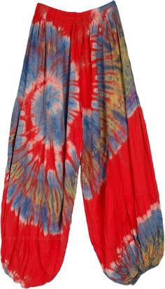 A lightweight and fun red rayon harem pants with all over swirly tie-dye work in yellow and blue.  These pants feature an elastic waistband and elastic at the ankles and are perfect for mixing and matching for different looks. #tlb #SplitSkirtsPants #vacationclothing #beachwrap #TieDye #bohemianfashion #hippieharempants #gypsypants #summerclothing #tiedyepants Hippie Fall Outfits, Diy Hippie Clothes, Hippie Shoes, Dye Pants, Velvet Tie, Tie Dye Hippie, Tie Dye Pants, Hippie Pants, Hippie Look