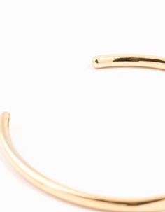 Upgrade your everyday style with our durable cuff bracelet, crafted from water-resistant gold-plated stainless steel. Its sleek, classic design ensures long-lasting elegance, ideal for effortless sophistication in any setting. Material: Gold Plated, Stainless Steel Color: Gold Dimensions: Diameter: 5.5 cm Length: 18 cm - Stretch Fit Width: 5 mm Waterproof/Resistant: Waterproof pieces from this collection are crafted from stainless steel, meaning they're sweat, swim and shower proof! This piece f Wrist Cuffs, Cuff Bangles, Everyday Style, Cuff Bracelet, Everyday Fashion, Classic Design, Gold Plate, Bangles, Water Resistant