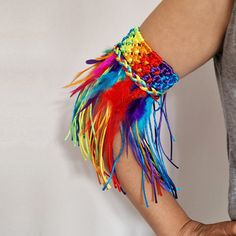 Add a splash of color and celebration to your festival outfit with this beautifully crafted armband. Made with soft, high-quality materials, our armband is comfortable to wear all day long, whether you're dancing at a pride parade, attending a music festival, or simply expressing your identity with pride. 🌈 Handcrafted with care, each armband features the iconic rainbow colors of the LGBTQ+ community, symbolizing unity, diversity, and love. The tassel and fuzzy design elements add a playful tou Bohemian Rainbow Bracelets For Festivals, Rainbow Bohemian Bracelets For Party, Bohemian Rainbow Bracelets For Party, Colorful Summer Party Bracelets, Multicolor Tassel Bracelets For Festivals, Pride Festival Outfit, Pride Party, Pride Festival, Festival Ideas