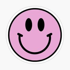 a pink smiley face sticker with black eyes and one big smile on it's face