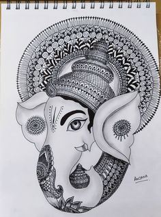 a drawing of an elephant's face on paper