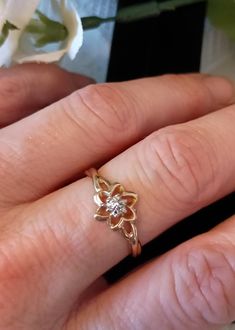 Vintage 10k JCM flower ring. Diamond chip in center of flower.  Pre-owned. Size 7. Classy Gold Rings, 90s Rings, Engagement Rings Flower, Flower Ring Diamond, Wedding Ring Flower, Flower Gold Ring, Flower Wedding Ring, Flower Diamond Ring, Cute Engagement Rings