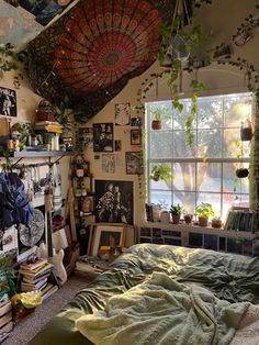 a bed room with a neatly made bed and lots of plants