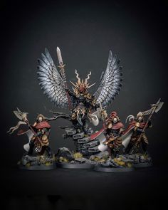 a group of warhammers with wings and swords on their heads, standing in front of a black background