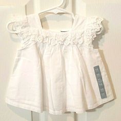 Baby Gap White Eyelet Top With Button Closure On Back Condition Is New With Tags Size Is 6-12 Months 100% Cotton Shell / Lining Please See All Pictures And Video For Condition Short Sleeve Tops For Summer Baptism, Gap Cotton Tops For Playtime, Cotton Tops For Baptism In Spring, Cute Gap Tops For Playwear, Fitted Top For Baptism In Spring, Fitted Tops For Baptism In Spring, White Eyelet Top, Eyelet Top, White Eyelet