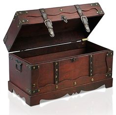 an old fashioned wooden trunk is open and ready to be used as a storage box