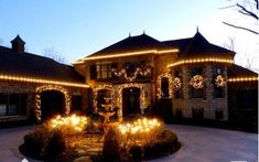 a house with christmas lights on the front