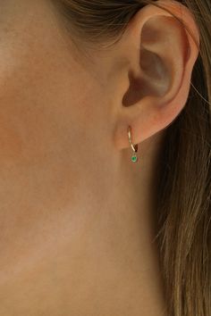 Our beautiful solid 14k gold earrings are a stunning addition to your jewelry collection, crafted with solid 14k gold hoops and stunning emeralds. Perfect for layering. forever piece modern dainty ✨ships the next day ✨ Details: Material: 14k solid gold hoops with emerald Hoop dimensions: outer diameter 10mm, inner diameter 8mm total length 14mm Post thickness: 0.7mm Emeralds: 1.8mm Hypoallergenic Handmade item Ships from a small business Dainty Hoop Earrings With May Birthstone, Dainty May Birthstone Hoop Earrings, Dainty May Birthstone Hoop Jewelry, Everyday Yellow Gold Hoop Earrings With Gemstone, Elegant Everyday Hoop Earrings With May Birthstone, Everyday 14k Gold Hoop Earrings With Gemstones, Fine Jewelry May Birthstone Huggie Earrings, Hoop Earrings In Yellow Gold For May Birthstone, Yellow Gold Gemstone Hoop Earrings For Everyday