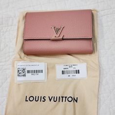 Brand New With Tag. Magnolia Color. Neutrals Taurillon Leather Brass Hardware Leather Lining & Four Interior Pockets With 8 Card Slots Snap Closure Includes Dust Bag Magnolia Colors, Louis Vuitton Capucines, Bags Louis Vuitton, Compact Wallet, Brass Hardware, Snap Closure, Louis Vuitton Bag, Magnolia, Card Slots