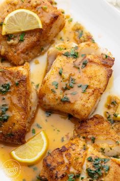 chicken with lemon sauce on a white plate