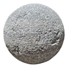 a round gray rock sitting on top of a white surface