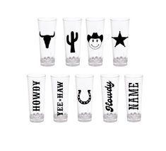 six shot glasses with the words texas and cowboys on them, all in different styles