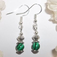 I Love The Variations In These Southwestern Style Beads. This Handmade Set Has Beautiful Green And Black Simulated Malachite Colored Beads. They Also Have Silver Toned Costume Jewelry Beads That Are Antiqued In Black. The Pair Dangle & Drop From 925 Sterling Silver French Fish Hook Ear Wires For Women's Pierced Ears. Measure 1 5/8 Inches Long & 1/4 Inch Wide. Each Single Earring Weighs Approximately 1.3 Grams. Very Lightweight. Great Fashion Accessory Gift Idea For Her! Little Funky Unique S Xs Green Beaded Earrings With Silver Beads As Gift, Sterling Silver Jewelry With Green Dangling Beads, Beaded Malachite Jewelry Gift, Gift Beaded Malachite Jewelry, Gift Malachite Beaded Jewelry, Green Sterling Silver Beaded Earrings With Round Beads, Mauve Earrings, Blue Pearl Earrings, Celtic Knot Jewelry