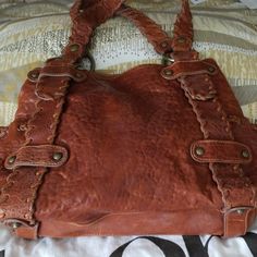 Beautiful, Large, Distressed Leather Kooba Shoulder Bag In Reddish Brown. Whipstitched Handles/Straps Circle The Entire Bag. Braided Leather Trim On Side Pockets. Clean Inside And Out. The Only Flaw I See Is A Little Discoloration On The Brass Kooba Plaque, Which Seems To Be An Issue With The Brand. This Bag Has Never Been Used - Not Even Once. Dust Cover Included. Make It Yours! Kooba Handbag, Kooba Handbags, Reddish Brown, Distressed Leather, Dust Cover, Braided Leather, Leather Trim, Brown Gold, Leather Trims