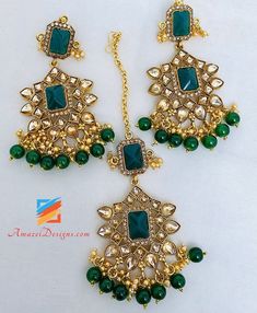 Golden Green Polki Necklace Earrings Tikka Set. Available to shop online and delivered to your doorsteps anywhere in the world with our Everything-Everywhere FREE Shipping. 📦Unmatched FREE Worldwide Shipping EXPLORE more Indian Earrings and Jhumki Earrings. Maang Tikka Sets and Tikka Set Punjabi Match with our pretty Single Line Necklaces Mandeep, Canada ⭐️⭐️⭐️⭐️⭐️ Thank you so much. I love the choora, perfect fit as well. Gurjit, Canada ⭐️⭐️⭐️⭐️⭐️ Such an amazing experience with amazel designs Green Chandelier Earrings For Festivals And Gifts, Green Traditional Chandelier Earrings As Gift, Traditional Green Chandelier Earrings As Gift, Traditional Green Chandelier Earrings For Gift, Green Jewelry For Festivals And Gifts, Traditional Green Plug Earrings For Gift, Traditional Green Plug Earrings As Gift, Green Jewelry With Matching Earrings For Festivals, Maang Tikka Set