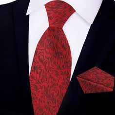 Eternal Red Abstract Tie This new red edition of the Eternal Tie brings back the coveted rich cardinal red and black colorway that is a staple to any modern wardrobe. The red background combined with a black, abstract, wavy lined overlays creates an unforgettable pattern you will want to wear to work, church or even an interview. The PRIME Logo adorns the back of the tie and creates an additional tie keep for your tie to stay in place. Choose From: Single Tie Tie and Pocket Square Material of Ti Elegant Burgundy Fitted Suit And Tie Accessories, Elegant Fitted Burgundy Suit And Tie Accessories, Elegant Burgundy Suit And Tie Accessories For Business, Red Silk Tie For Business, Red Standard Tie, Red Silk Ties For Business, Red Wedding Suit And Tie Accessories, Elegant Burgundy Tie For Formal Occasions, Elegant Red Neckwear With Ties