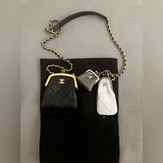 Chanel Multi Clutch With Chain Quilted Leather Overview Exterior Color Black, Silver Interior Color Black, Silver Exterior Material Leather Interior Material Leather Hardware Color Aged Gold Accessories Extra Pochette Pochette 2 Of The Purses Can Be Removed And Used As Wallets Or Coin Purses!! Unique And Rare Bag!!! Size And Fit 4"W X 4"H X 1"D 22" Strap Drop Luxury Black Coin Purse With Interior Key Chain Holder, Elegant Black Bag For Personal Use, Chanel Chevron, Chanel Tote Bag, Chanel Jumbo, Chanel Chain, Chanel Flap Bag, Chanel Shoulder Bag, Leather Hardware