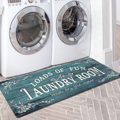 a washer and dryer sitting next to each other in front of a door