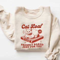 Cat Loaf Sweatshirt, Funny Cat Shirt, Trendy Vintage Retro Sweatshirts, Meme Sweatshirt, Cat Lover, Graphic Shirts, Cat Lover Gift, 🧵 HOW TO ORDER   - Pick your size and color from the drop down menus  - Review the sizing and color options in the listing photos  - Add the item to your cart and complete the checkout process  - We'll start working on your order right away! 🧵SIZING  - Please review the listing photos to see the size charts  - These photos will also show you how to order a regular Cat Loaf, Cat Merch, Cat Sweater, Retro Sweatshirts, Sweat Shirts, Holiday Sweatshirt, Cat Lover Gift, Cat Shirt, Mom Tees