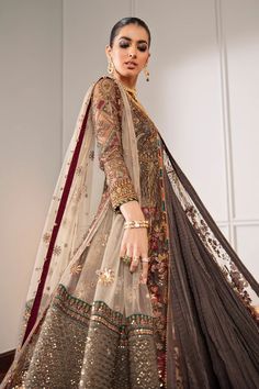 A delicately crafted 4-piece exquisite net ensemble to make you stand out. The ravishing embroidery with intricate floral and floret patterns upholds the luxury this dress offers. Embroidery runs through shirt and dupatta, lightening up the vista. The dyed silk trouser completes the outfit. The inner of the gown is stitched plain (not crushed as shown) The design accessories showcased in images are included. Original Designer Dress Dress fabric: Net Embroidered front and back Embroidered net sle Anarkali With Jacket, Net Sleeves, Organza Lehenga, Salwar Kamiz, Chiffon Collection, Embroidered Chiffon, Maria B, Ghagra Choli, Come Undone