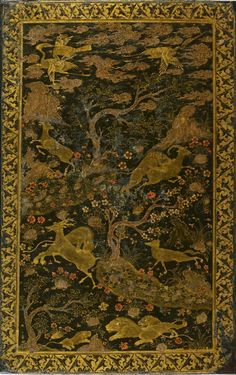 an intricately decorated rug with animals and flowers