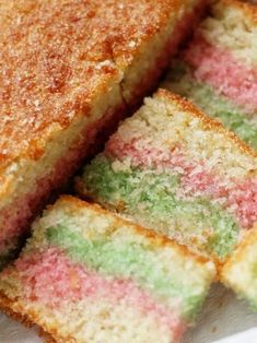 several slices of cake sitting on top of a white plate