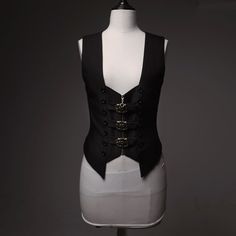 A classic zip-up vest with a decorated belt on the chest. A silhouette that shows off your waistline. The vertical jet black button fastenings are impressive. Capture the eye with its mysterious darkness and gorgeous sparkle. 
 
 

 

 
 
 What is included in your order 
 
 Best 
 
 
 
 Size 
 
 S size 
 
 Length: 53cm 
 Bust: 88cm 
 Waist: 68cm 
 
 M size 
 
 Length: 53cm 
 Bust: 92cm 
 Waist: 72cm 
 
 L size 
 
 Length: 57cm 
 Bust: 96cm 
 Waist: 76cm 
 
 XL size 
 
 Length: 57cm 
 Bust: 100cm Ouji Fashion, Black Button, Zip Up, Prince, Black