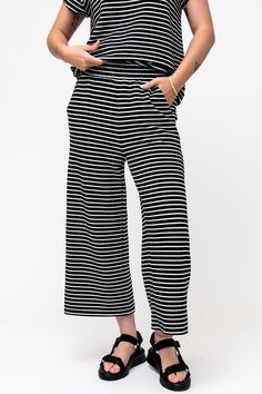 Pepper Pant in Black Clothing Holley Girl Striped Stretch Pants For Loungewear, Stretch Striped Pants For Loungewear, Black Spring Bottoms With Striped Hem, Spring Black Bottoms With Striped Hem, Black Bottoms With Striped Hem For Spring, Casual Stretch Bottoms With Striped Hem, Casual Black Bottoms With Banded Waist, Casual Cropped Black Bottoms, Casual Black Bottoms With Vertical Stripes