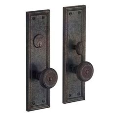 two door handles with knobs on each side