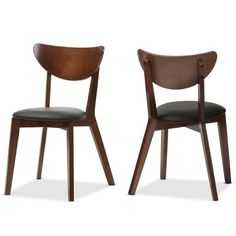 two wooden chairs with black leather upholstered backrests, side by side