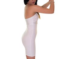 Transform Your Silhouette with the InstantFigure Strapless Slimming Dress Step into a new level of confidence with the Strapless Shapewear Slimming Dress with Empire Waist. This extraordinary compression slip dress is designed to instantly smooth and slim your figure, making you look up to 5 inches slimmer. Perfect for wearing under sheer dresses or as a chic, standalone piece. Key Benefits: Sleek Silhouette Enhancement: Experience instant contouring and a sleeker silhouette with the InstantFigu White Strapless Corset Dress With Built-in Bra, Strapless Corset Dress With Built-in Bra For Club, White Strapless Stretch Corset Dress, Strapless Stretch Dress With Built-in Bra, Fitted Strapless Shapewear Tube Top, Fitted Shapewear Strapless Tube Top, White Stretch Tube Top For Club, Strapless Stretch Bodycon Dress With Built-in Bra, Stretch Bandeau Strapless Dress For Club