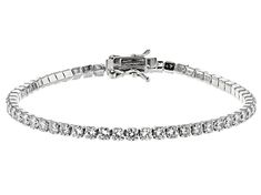 Pre-Owned Bella Luce ® white diamond simulant 9.58ctw round, rhodium over sterling silver bracelet. Measures approximately 7 1/4"L x 1/8"W and has a hidden box closure. The diamond equivalent weight is 6.16ctw..  This product may be a customer return, vendor sample, or on-air display and is not in its originally manufactured condition.  It may not be new.  In some instances, these items are repackaged by JTV. Classic Sterling Silver Bracelet With Sparkling Stones, Classic White Gold Bracelet With Sparkling Stones, Classic Sterling Silver Tennis Bracelet With Sparkling Stones, Classic White Gold Bracelets With Sparkling Stones, Formal Diamond Bracelet With Sparkling Stones, Classic Adjustable Sterling Silver Bracelet With Brilliant Cut, Classic Bracelets With Sparkling Stones, Formal Diamond Bracelet With Sparkling Round Cut Stones, Silver Tennis Bracelet With Round Cut For Formal Occasions