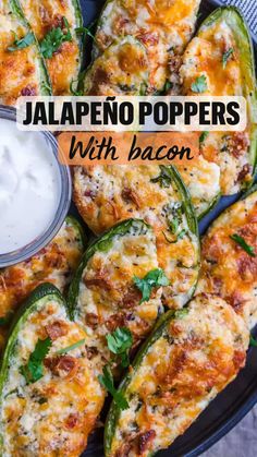 jalapeno poppers with bacon and ranch dressing on a plate next to a bowl of ranch dressing