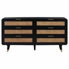 a black dresser with wicker drawers and gold trimmings on the front, against a white background