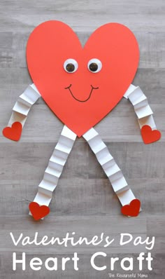 a paper heart with legs and arms made out of construction paper