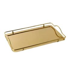 a gold metal tray with handles