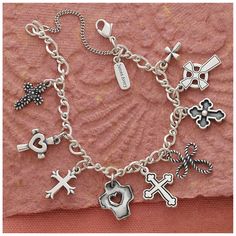 Medium Twist Charm Bracelet - James Avery Spiritual Silver Cross Charm Bracelet, Spiritual Silver Charm Bracelet With Cross, Nickel Free Sterling Silver Cross Bracelets, Metal Cross Bracelets, Symbolic Nickel-free Jewelry For Friendship, Nickel-free Sterling Silver Rosary Bracelet, Silver Link Jewelry With Charms, Metal Dangle Jewelry For Friendship, Friendship Dangle Jewelry With Removable Charms