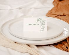 a white plate with a place card on it