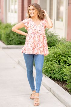 The Floral Ruffled Babydoll Top is a flirty and feminine addition to your wardrobe. The floral print adds a charming and romantic touch to the top. The ruffled detailing enhances the playful and girly vibes of the design. Pair this top with jeans or a skirt for a sweet and stylish outfit. Made from soft and lightweight fabric, this top is perfect for the warmer weather. Embrace your feminine side and turn heads in this delightful Floral Ruffled Babydoll Top that exudes effortless chicness! Featu