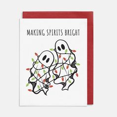 a card with two spooky ghost faces on it and the words making spirits bright